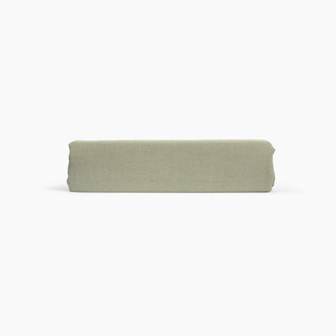 Avec linen align top sheet in sage folded neatly on a white background