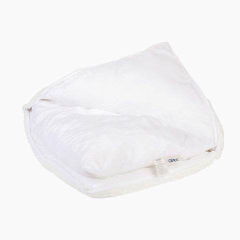 A detailed view of the insert in the Avec hybrid pillow on a white background