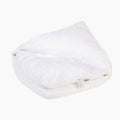 A detailed view of the insert in the Avec hybrid pillow on a white background