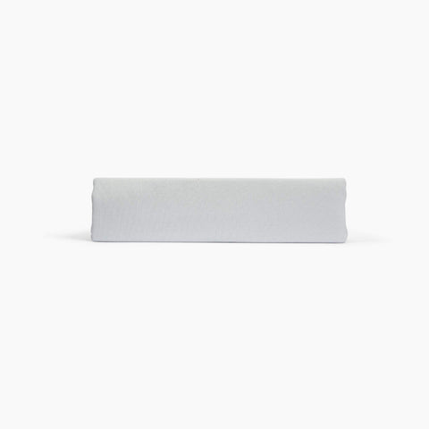 Avec linen fitted sheet in fog folded neatly on a white background